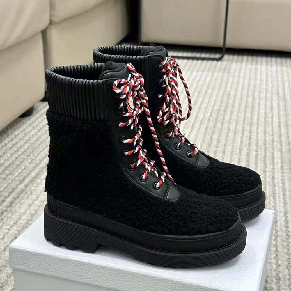 Side profile showcasing silhouette and lace closure details on Dior boot
