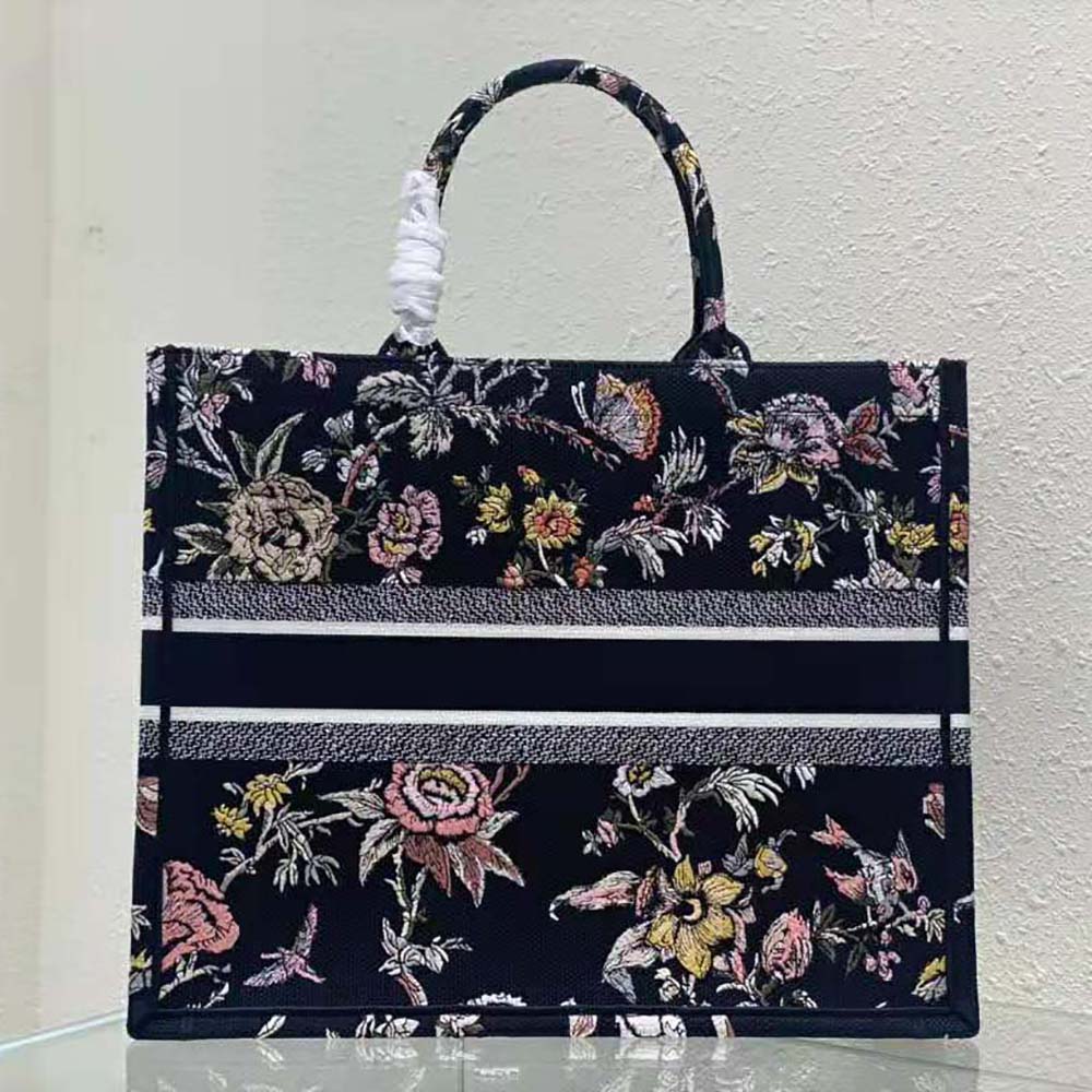 Side angle showing spacious silhouette of Dior Women Large Dior Book Tote
