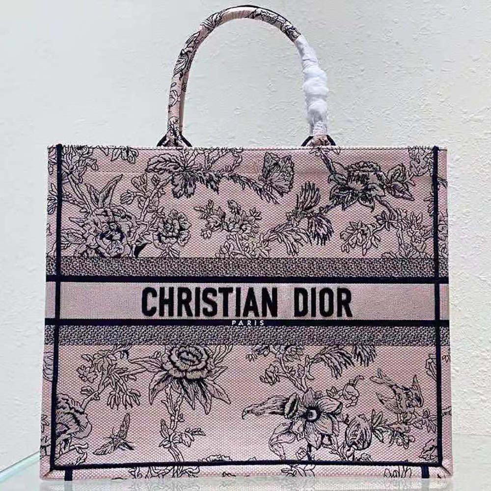 Close-up of intricate botanical embroidery on Dior Women Large Dior Book Tote