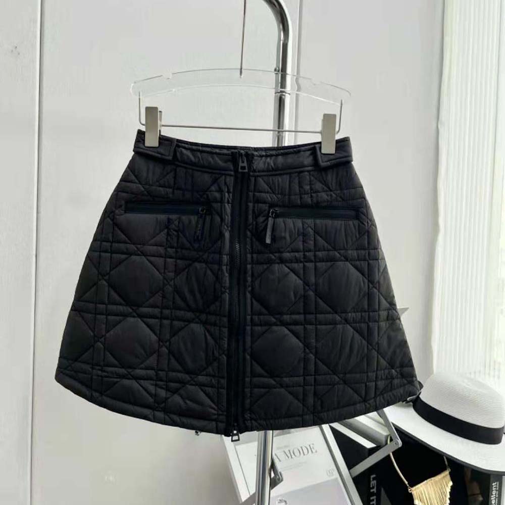 Close-up detail of quilted Macrocannage pattern on Dior black miniskirt
