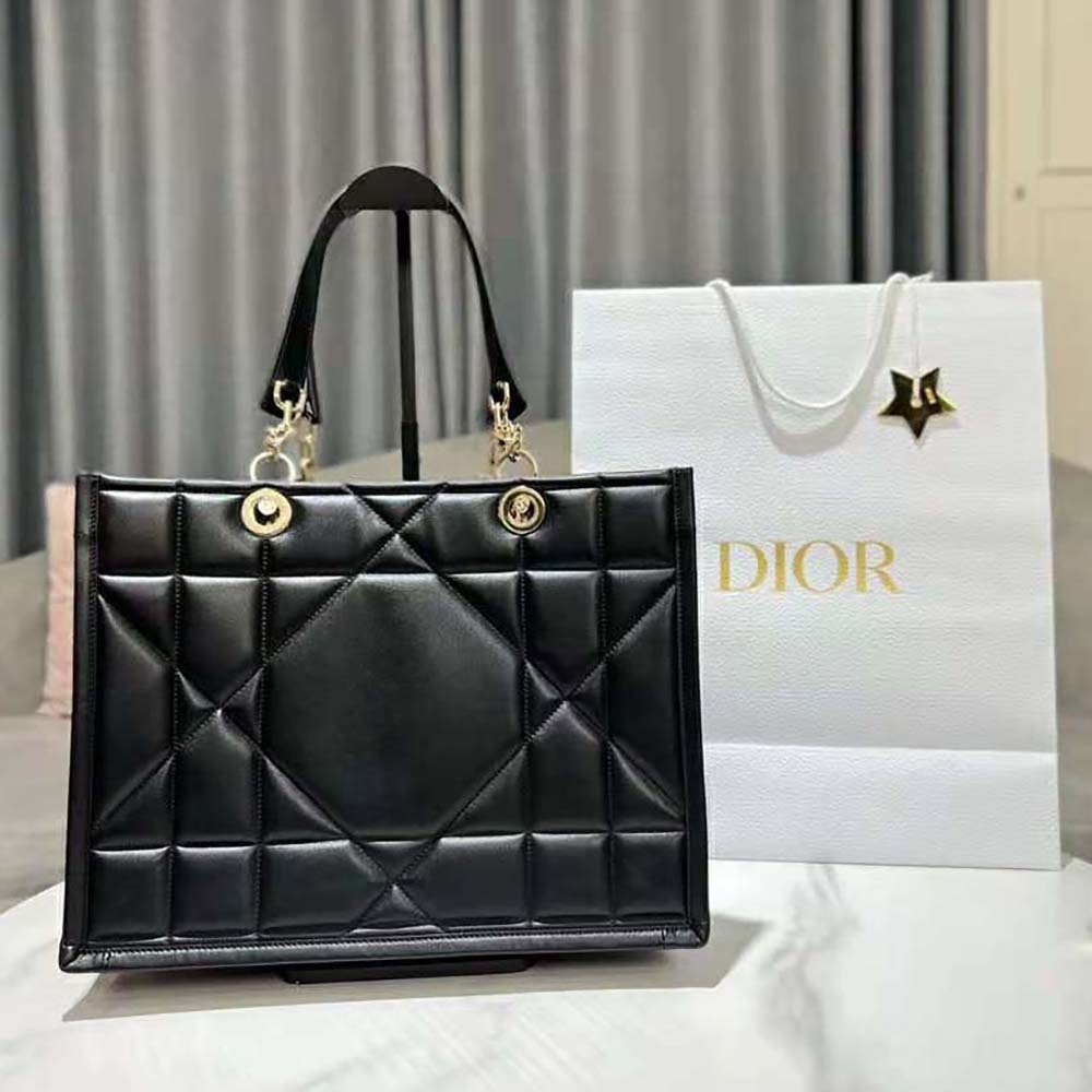 Close-up of Archicannage stitching and silver hardware on Dior Essential Tote