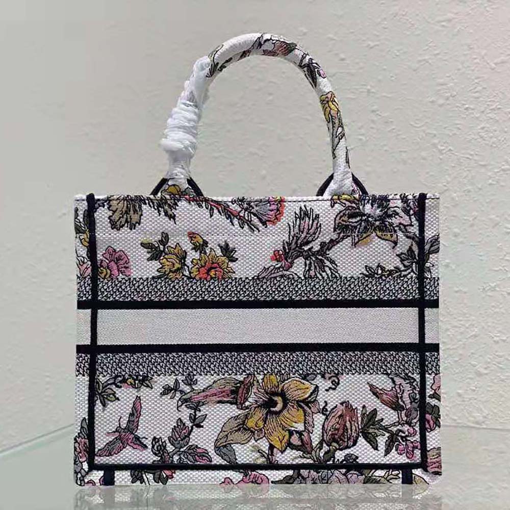 Side angle showcasing silhouette and silver hardware of Dior Women Small Dior Book Tote