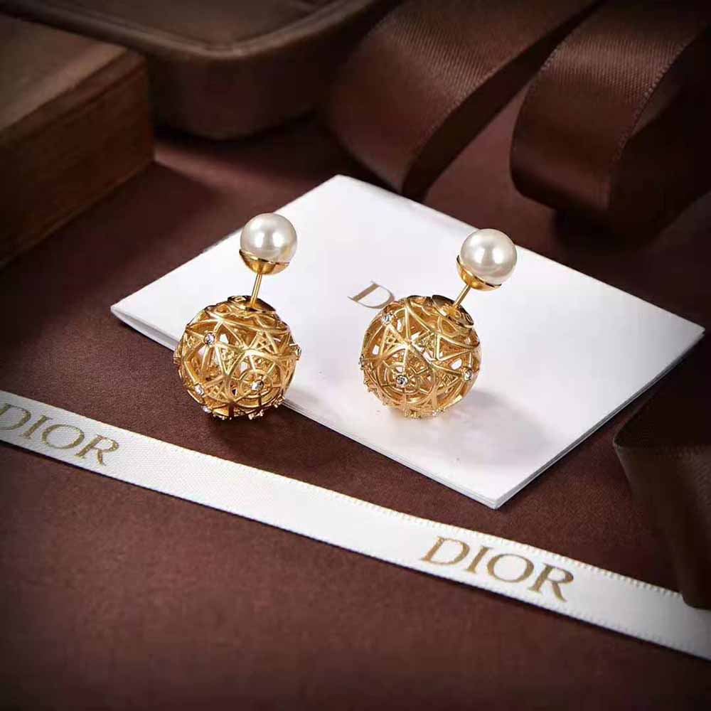 Side angle showing silver-tone crystals on Dior Women Tribales Earrings