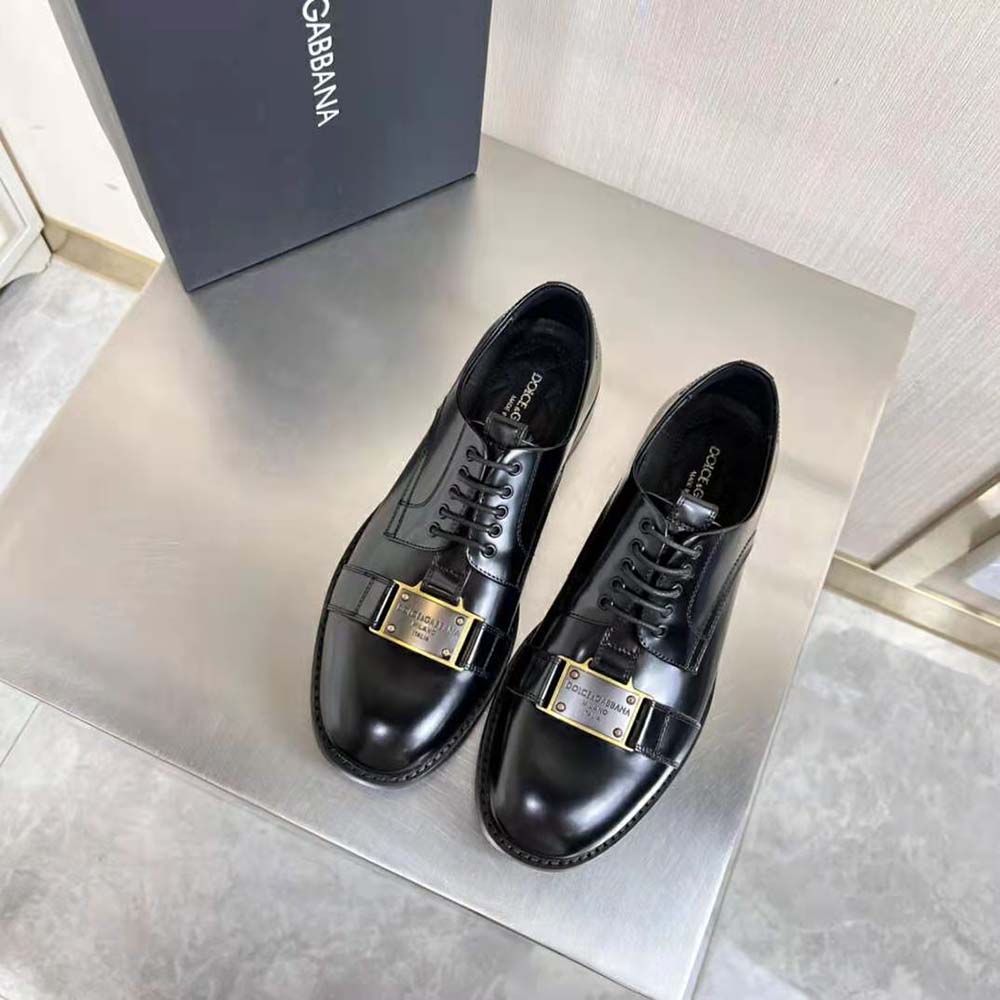 Close-up of branded metal plate on Dolce Gabbana D&G Men Derby Shoes
