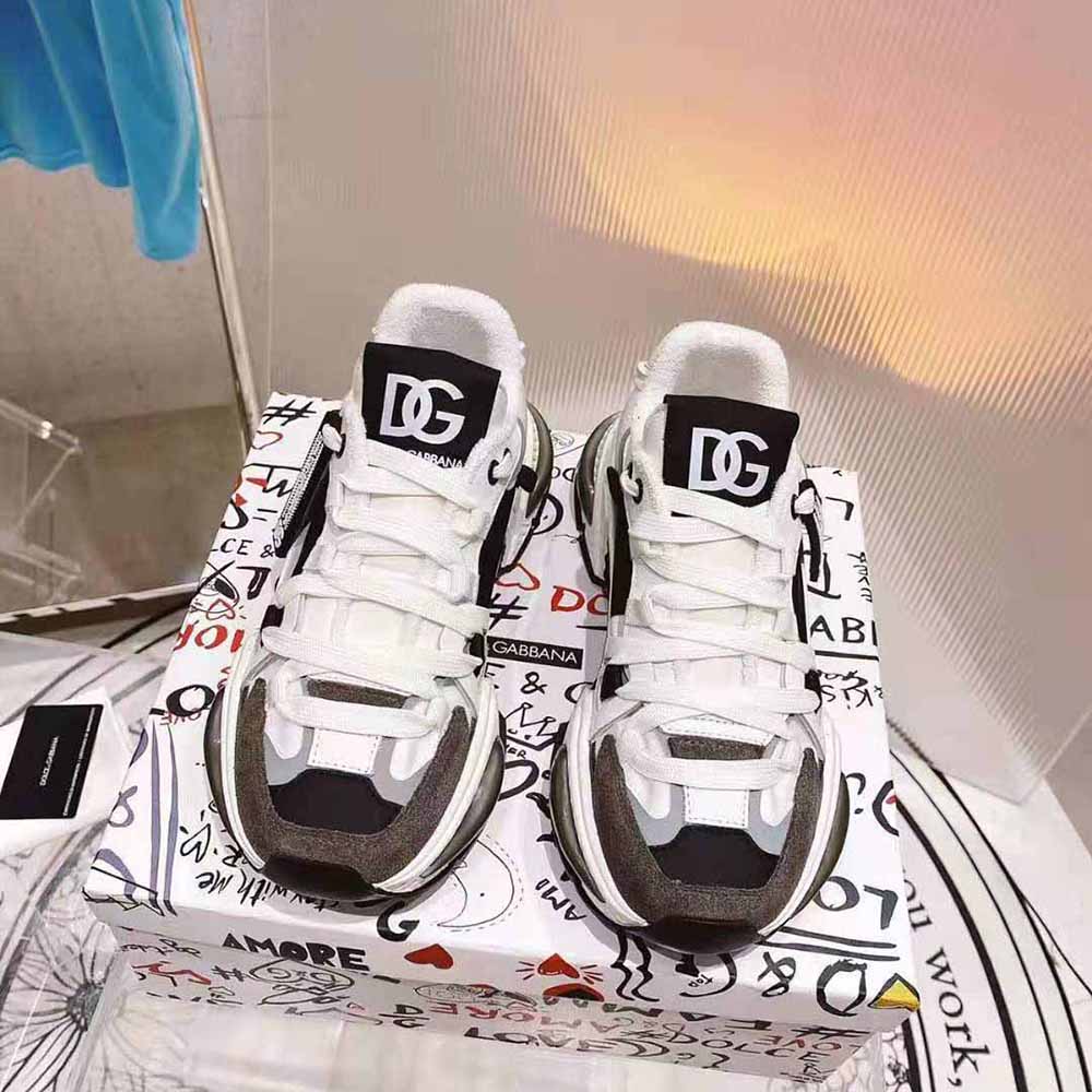 Close-up on embossed logo and metal eyelets of Dolce Gabbana D&G Airmaster Sneakers