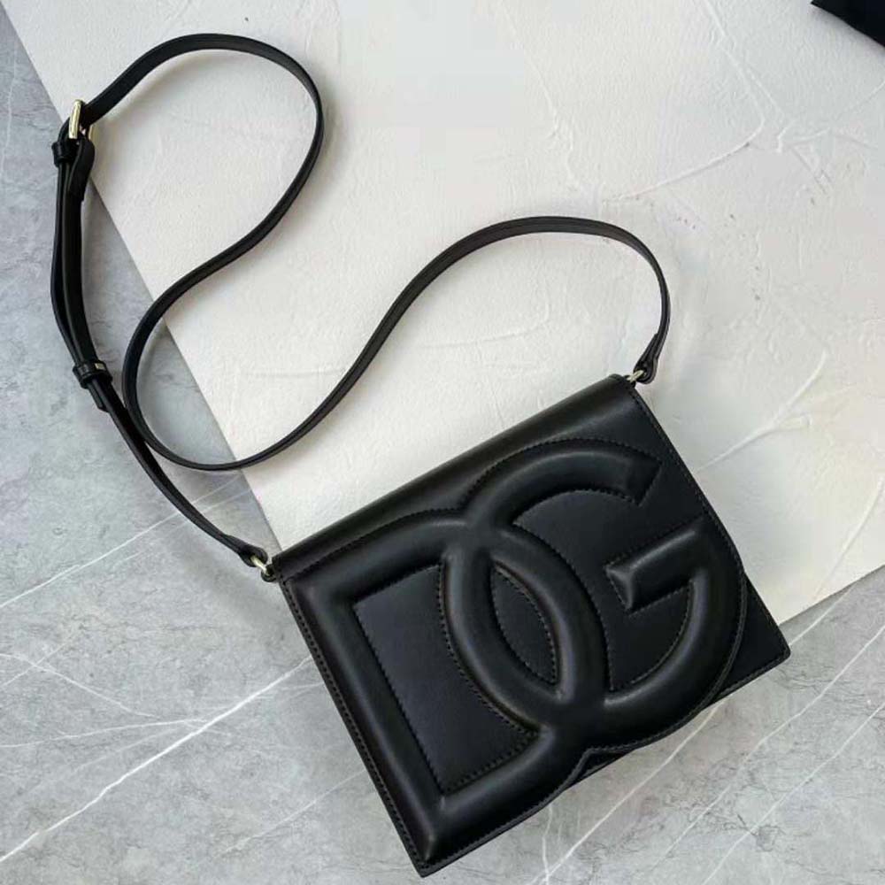 Side angle of sleek silhouette and adjustable strap on Dolce Gabbana D&G Women Calfskin DG Logo Bag Crossbody Bag-Black