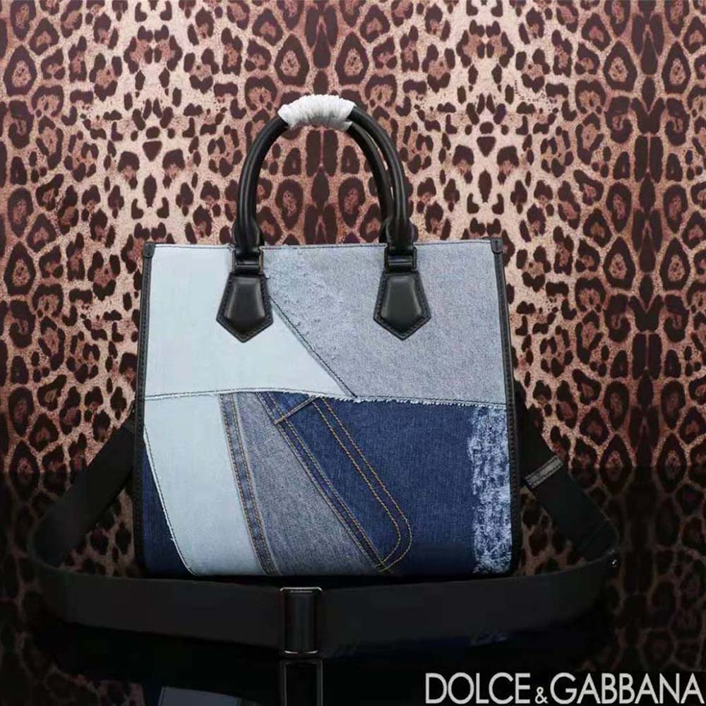 Side angle showing silhouette and gold-tone hardware of Dolce Gabbana D&G Women Denim Shopper