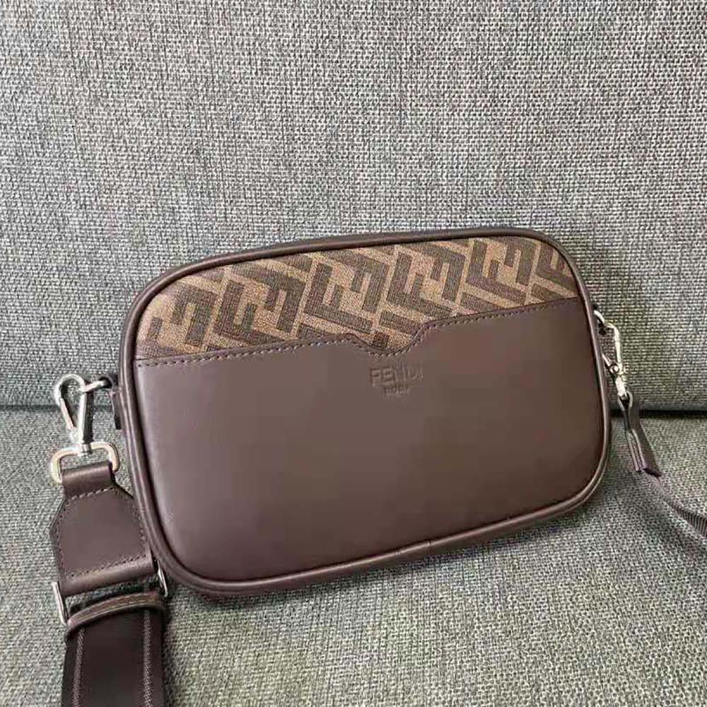 Side angle of Fendi Men Camera Case Brown FF Fabric Bag with adjustable strap