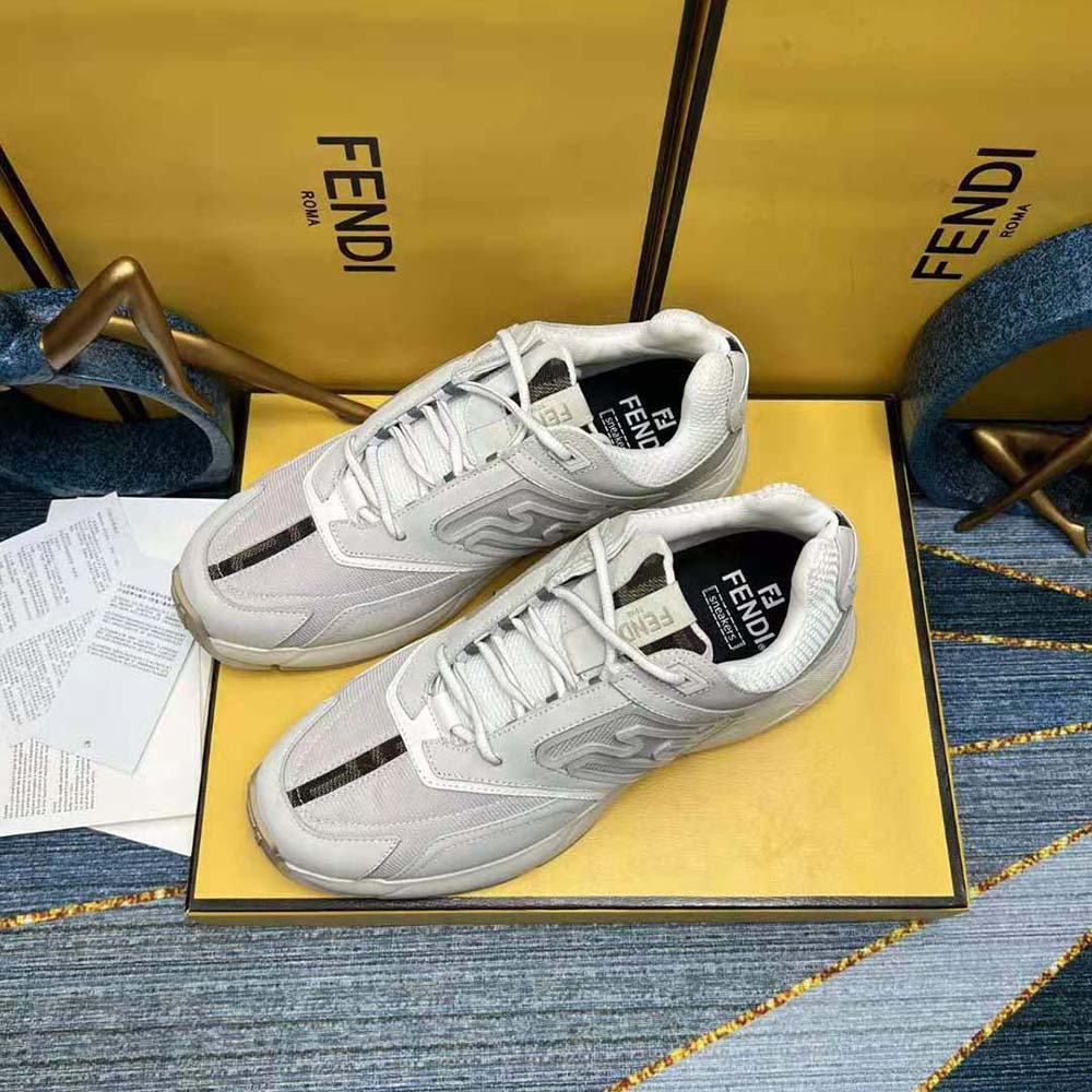 Top-down angle showing laces and leather texture on Fendi Faster Trainers