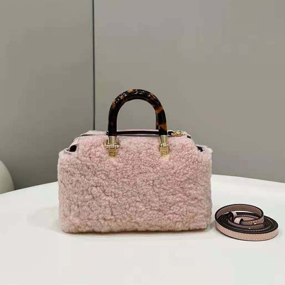 Side profile showing silhouette of Fendi Women By The Way Mini Light Pink Sheepskin Bag