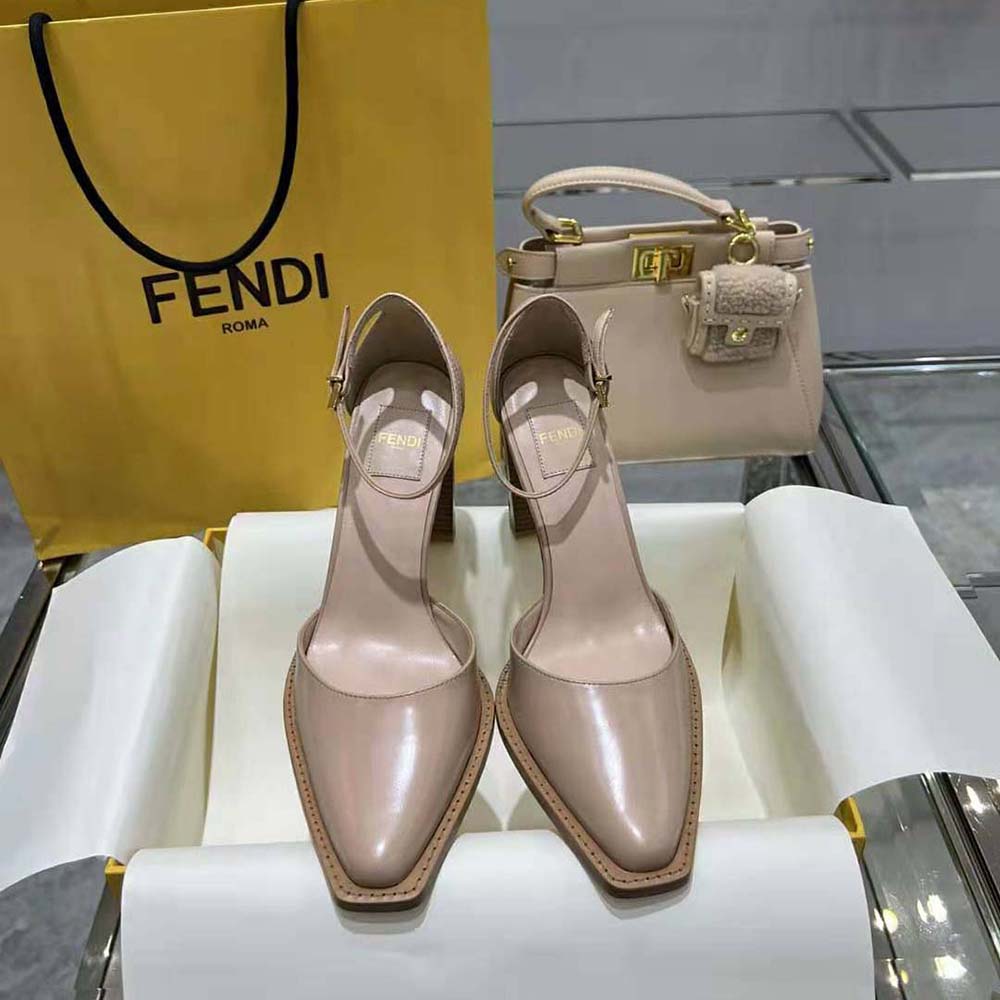 Close-up detail of gold hardware on Fendi Women Cut Pink Leather High-Heeled Court Shoes