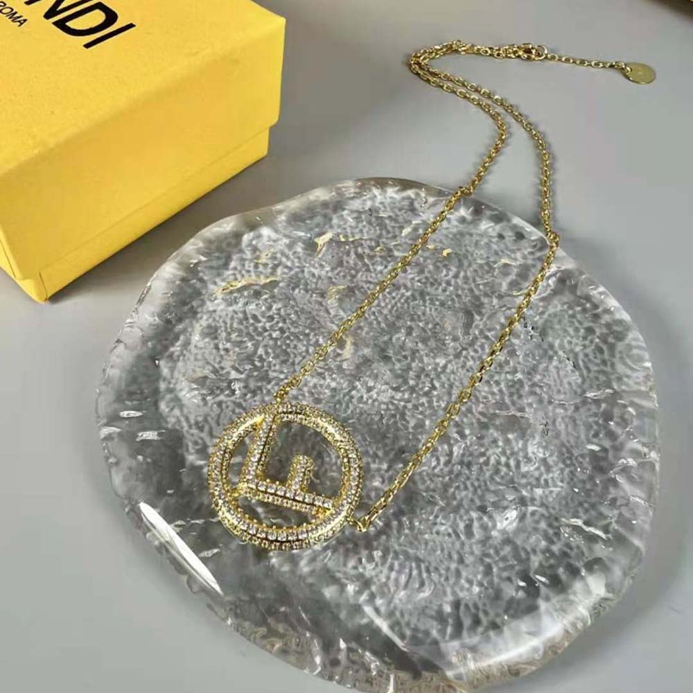 Close-up detail of Fendi Women F Is Fendi Necklace Gold-colored Necklace clasp and chain