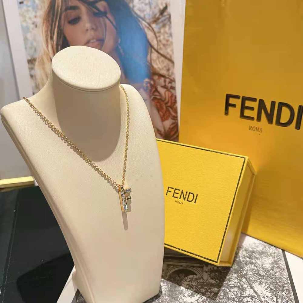Side angle of Fendi Women Fendi First Necklace Gold-Colored chain and clasp
