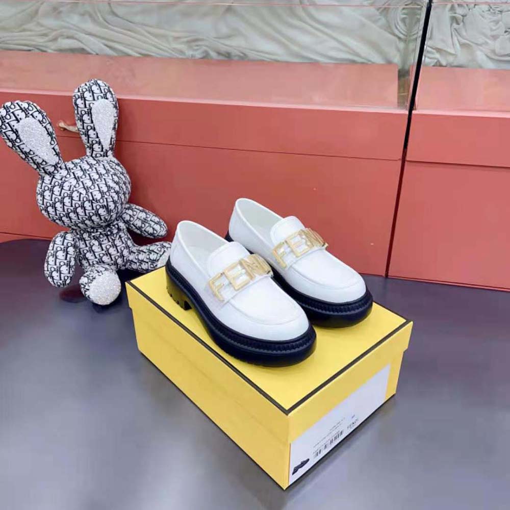 Close-up of embossed Fendigraphy detail on Fendi White Leather Loafers
