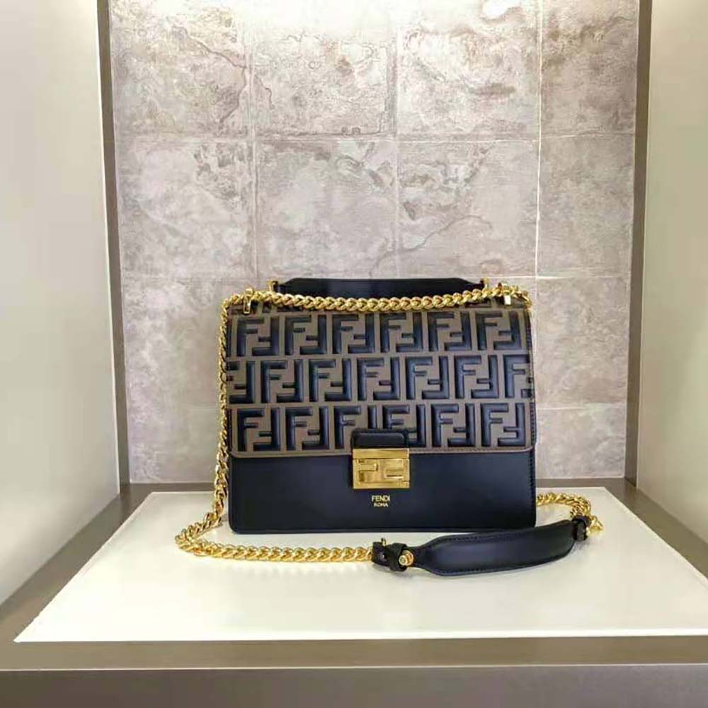Side angle highlighting smooth brown leather of Fendi Women Kan I Black Leather Bag-Black