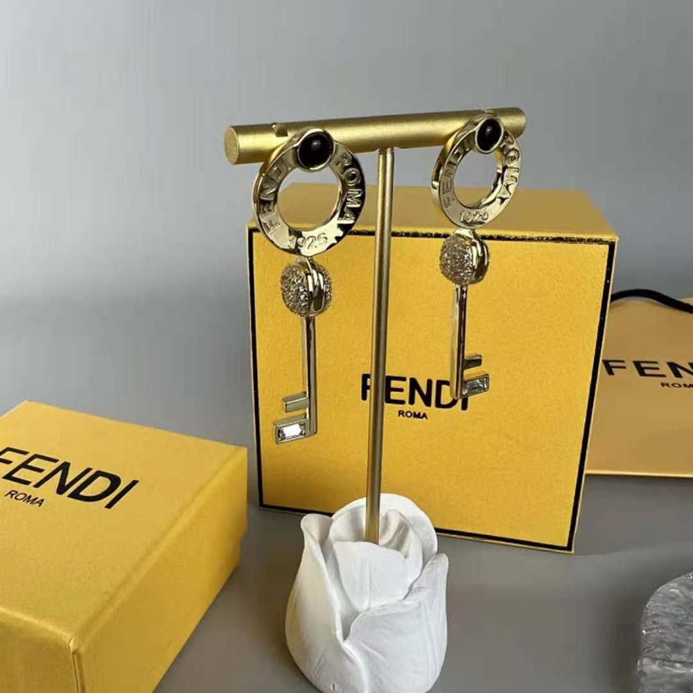 Side angle showing post back closure on Fendi Master Key Earrings