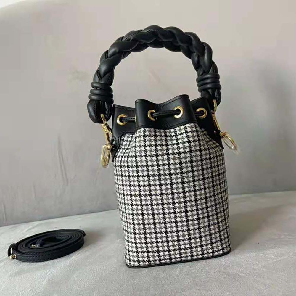 Side angle showing black leather trim of Fendi Women Mon Tresor Gray Houndstooth Wool Mini-Bag