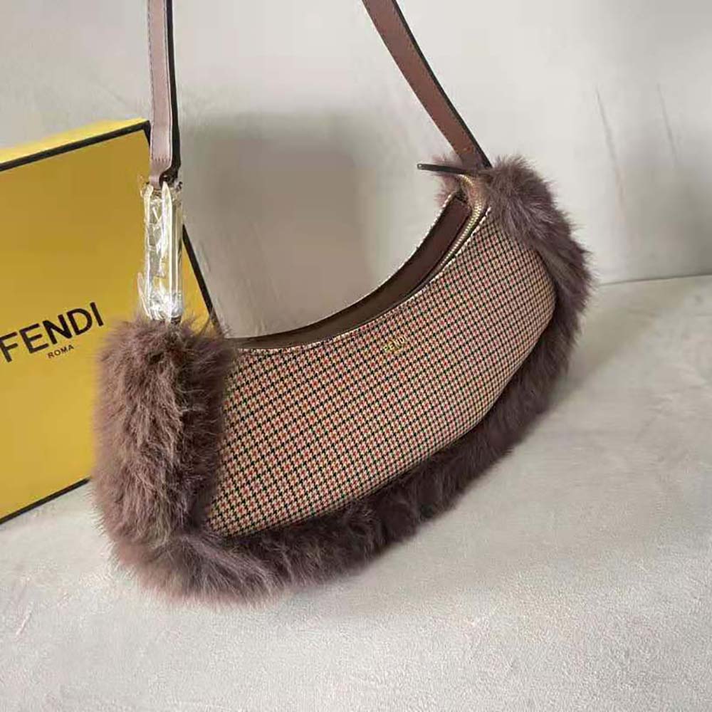 Side view showing plush fox fur detail on Fendi Women O’Lock Swing pouch