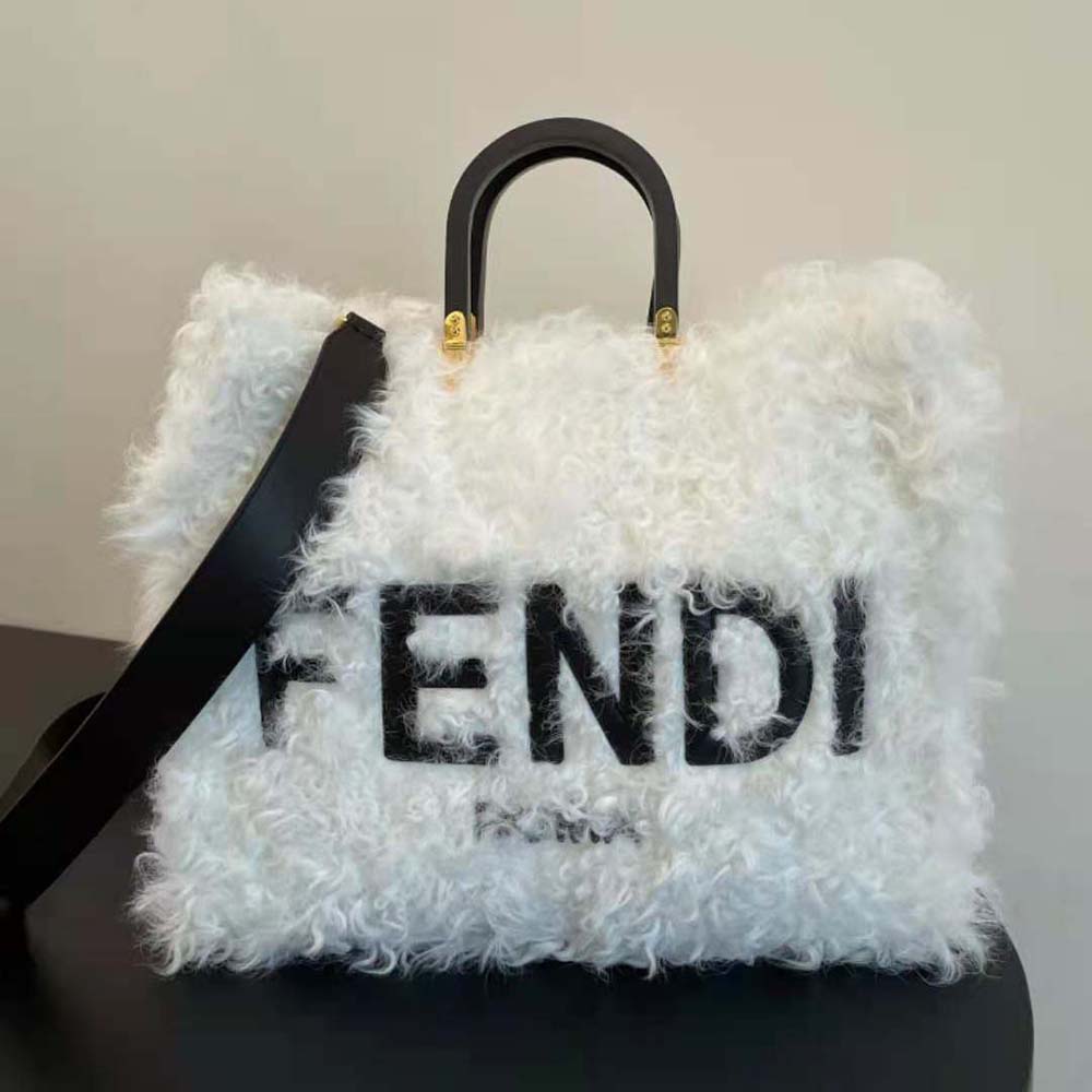 Close-up of gold-tone hardware on Fendi Women Sunshine Shopper