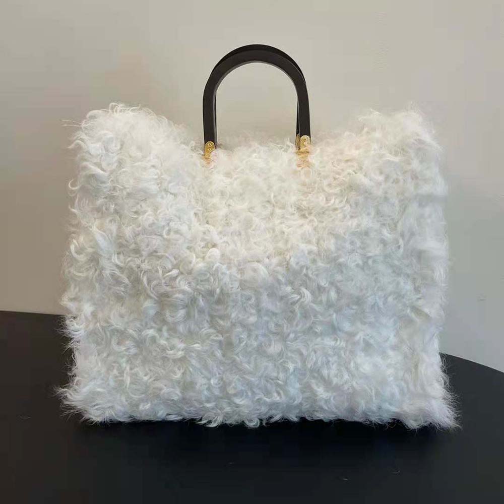 Side profile showing spacious silhouette of Fendi Women Sunshine Shopper