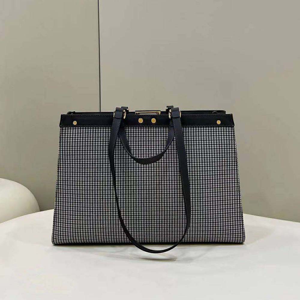 Side angle showing structured silhouette of Fendi Women X-Tote Gray Wool Shopper