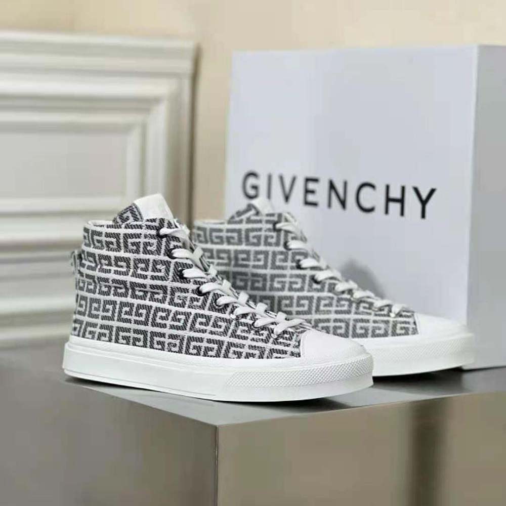 Close-up of black 4G jacquard fabric and Givenchy logo hardware