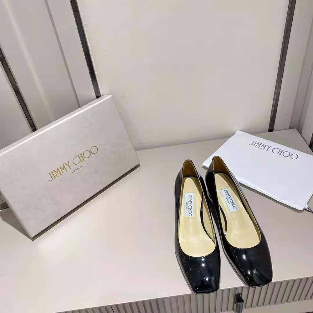 Close-up on gold-tone logo detail on Jimmy Choo Rydea Pump 45