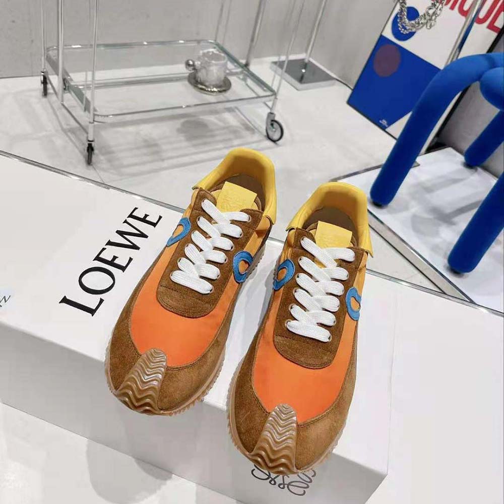 Close-up of lace-up and embossed Loewe detail on Flow Runner