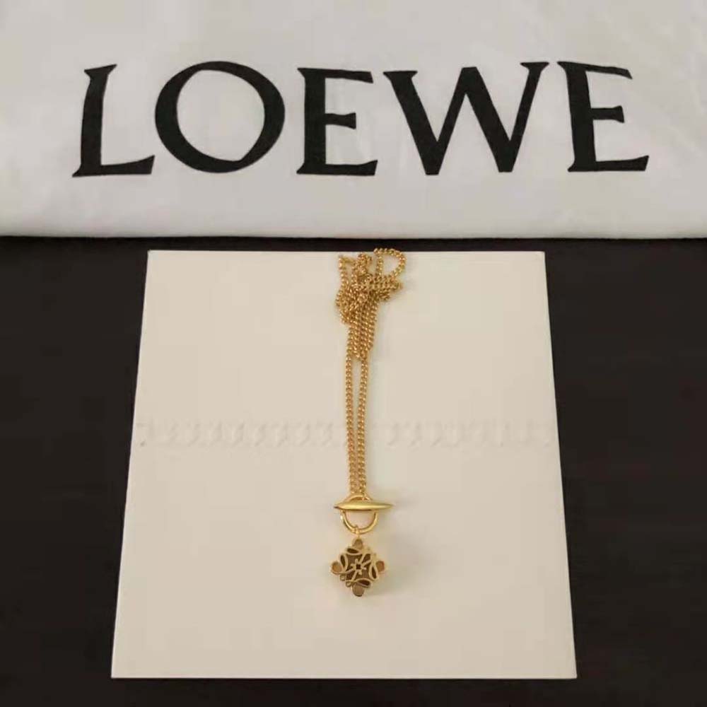 Close-up detail of gold Anagram motif on Loewe Women Anagram Pendant