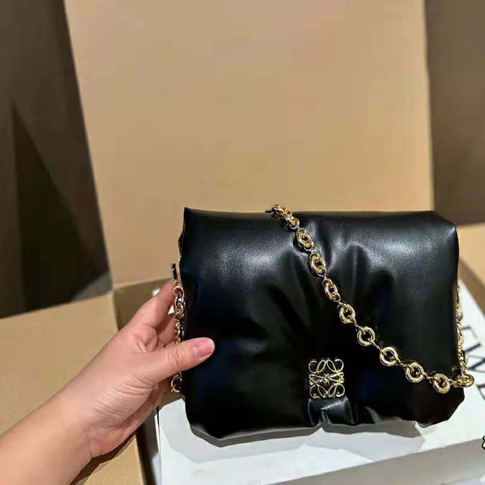 Close-up on silver-tone hardware and zipper of Loewe Women Puffer Goya Bag