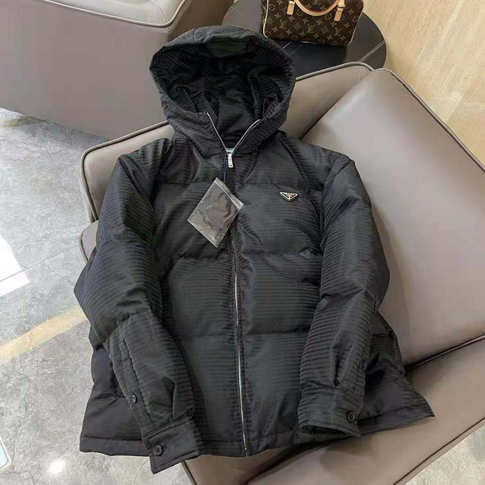 Side angle showing relaxed silhouette of Prada Men Re-Nylon Hooded Down Jacket-Black
