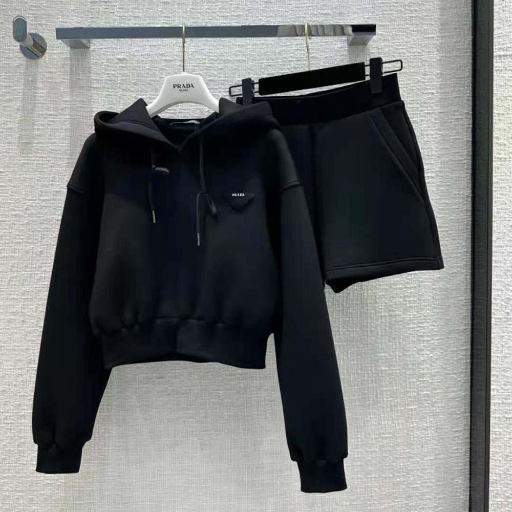 Close-up of black matte hardware and Prada logo on cotton fleece hoodie