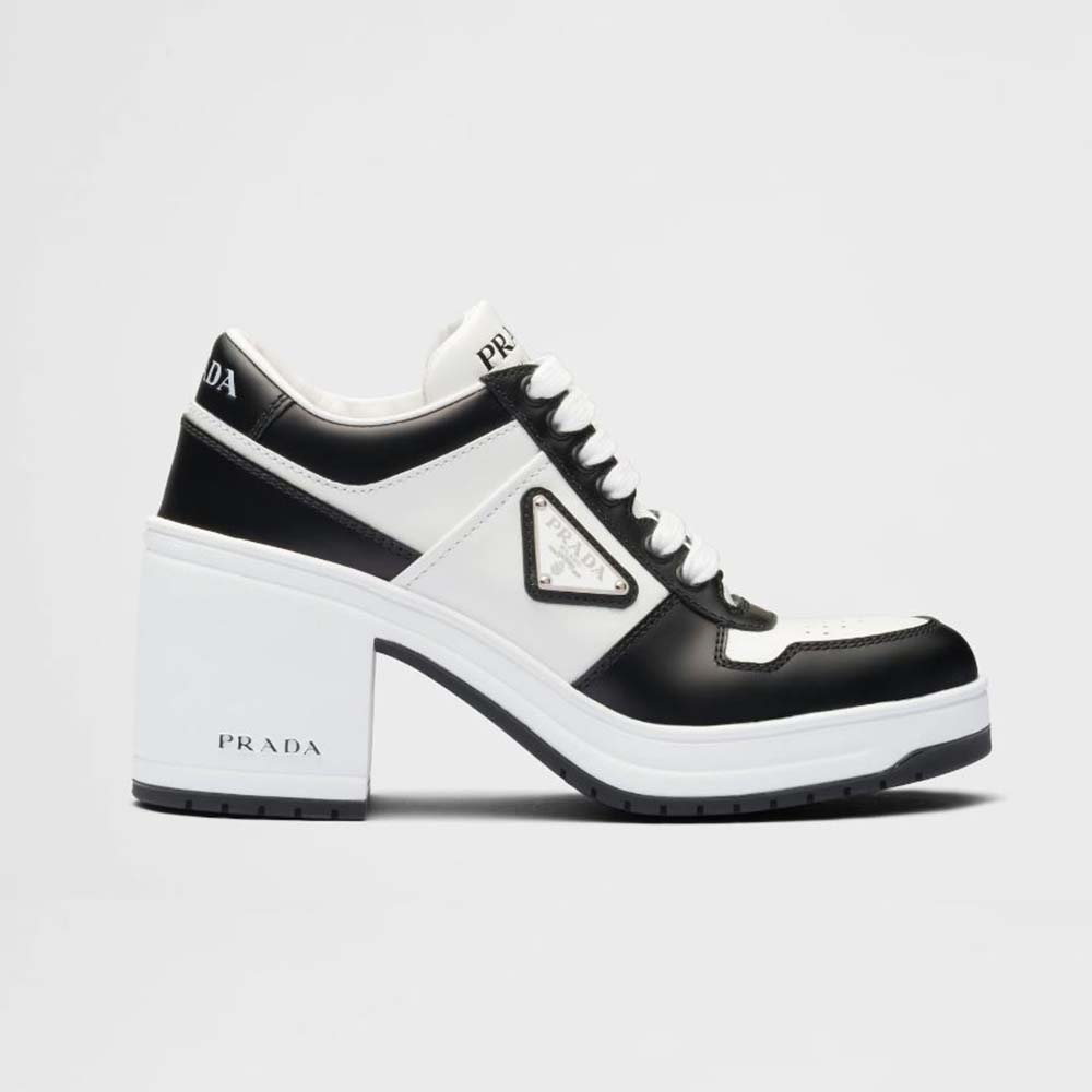 Front angle of Prada Women Downtown High-Heeled Leather Sneakers-Black
