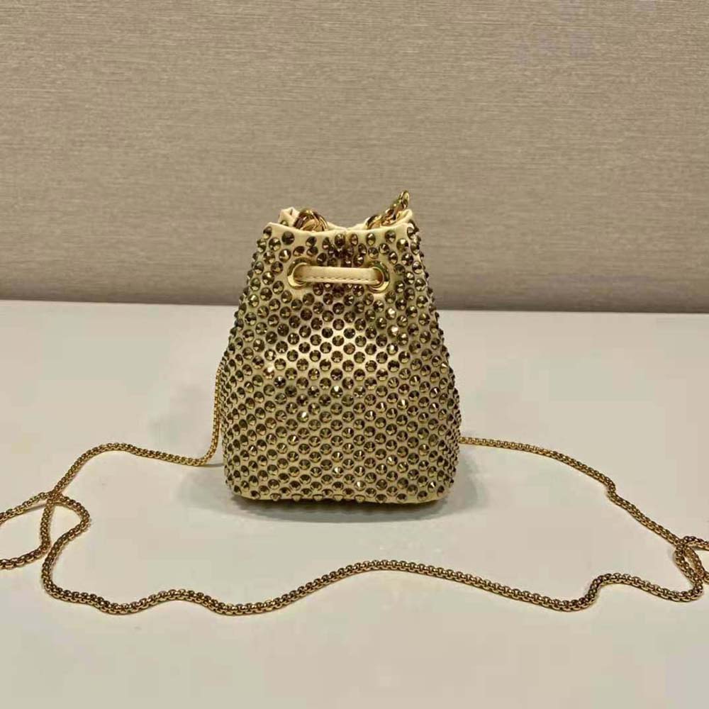 Side angle showing gold-tone hardware and strap of Prada Women Embellished Satin Mini-Pouch-Gold