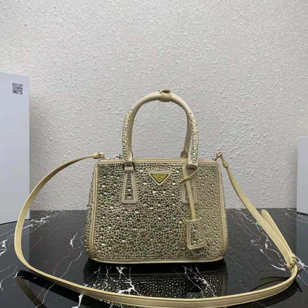 Close-up of crystal hardware detail on Prada Women Galleria Satin Mini-Bag