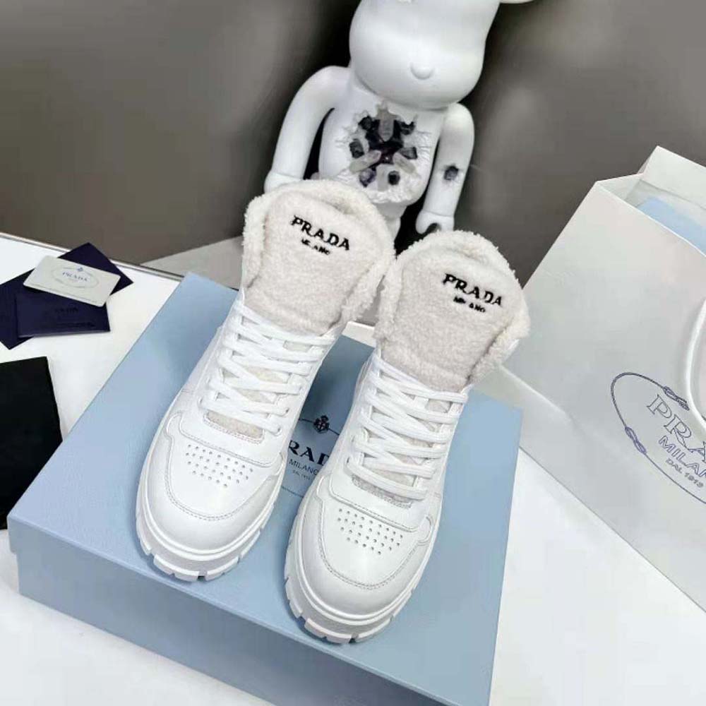 Close-up of shearling lining and leather texture on Prada high-top sneaker