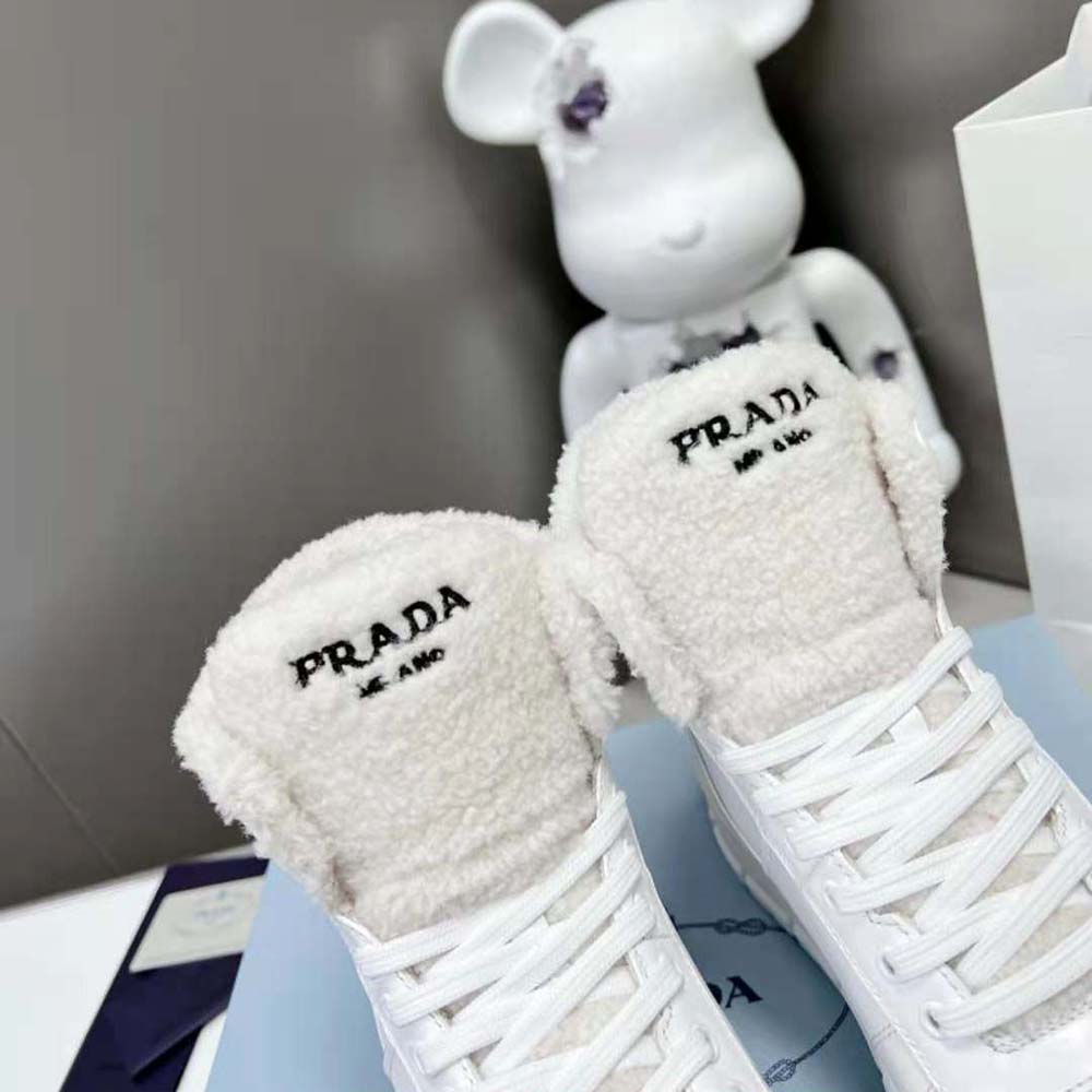 Prada Women Leather and Shearling High-Top Sneakers-White - image 9