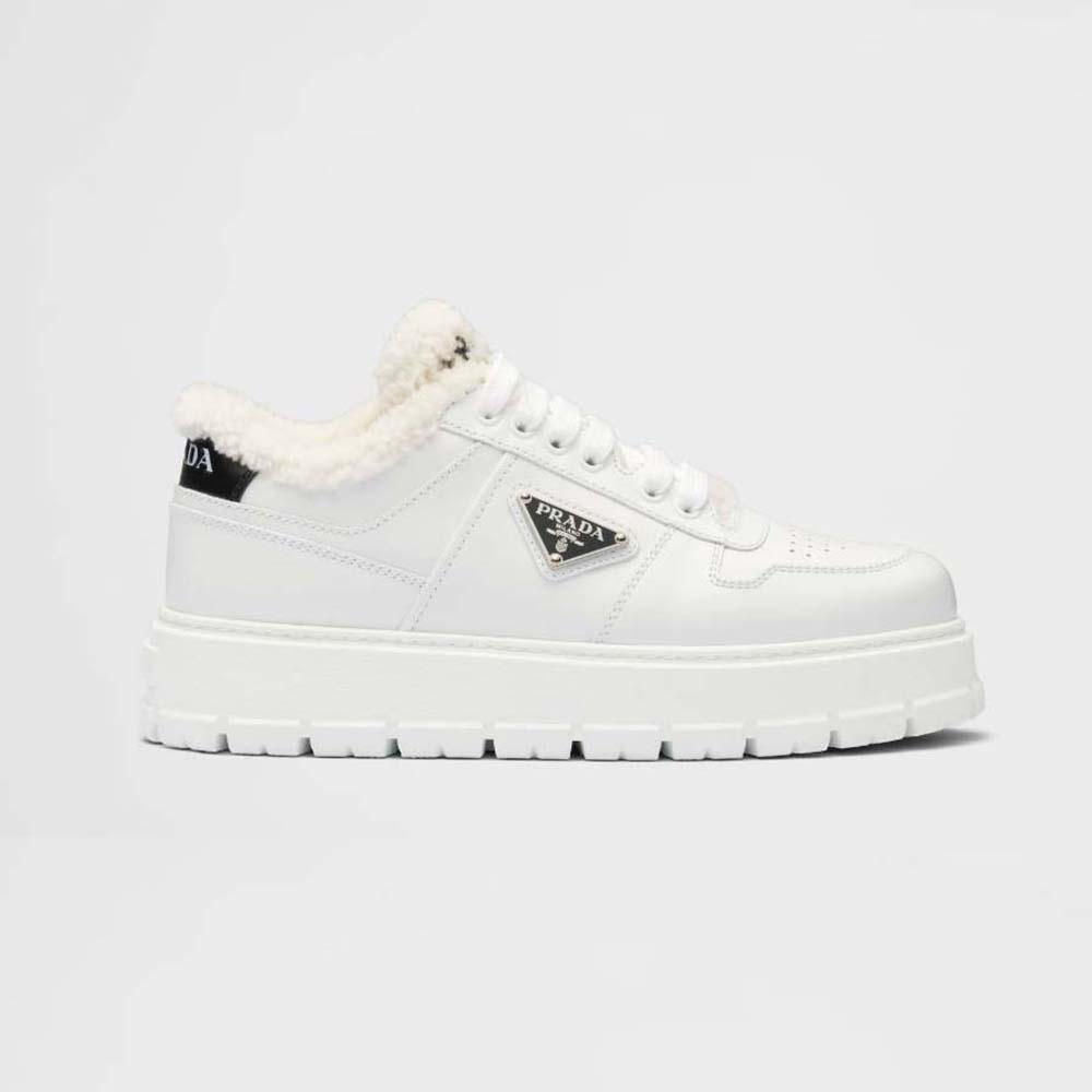 Side view of Prada Women Leather and Shearling Sneakers-White