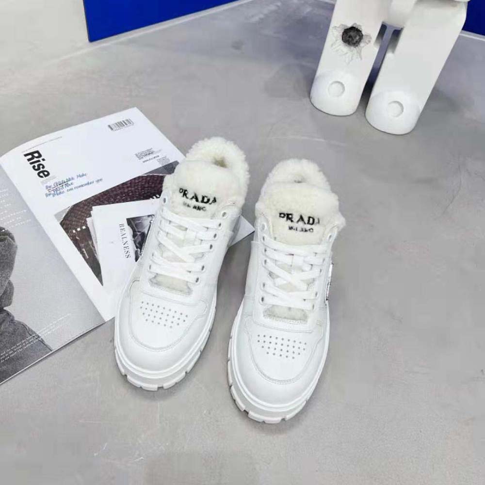 Close-up of shearling lining and leather on Prada sneakers