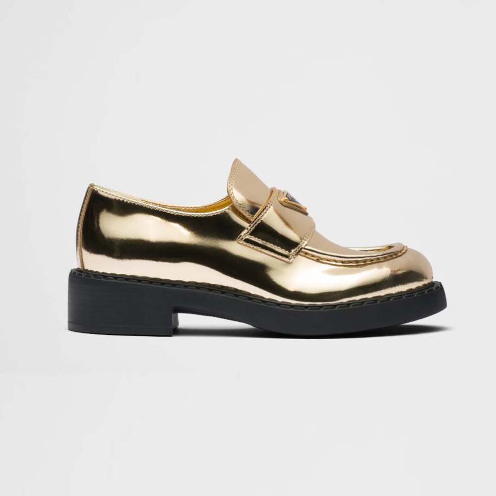 Side view of Prada Women Metallic Leather Loafers-Gold showing sleek silhouette