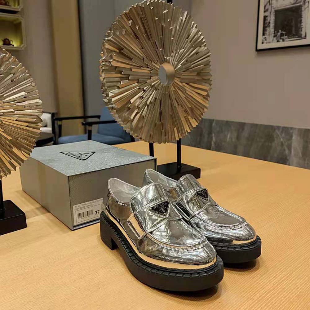 Overhead view highlighting metallic silver leather texture on Prada Women Metallic Leather Loafers-Silver