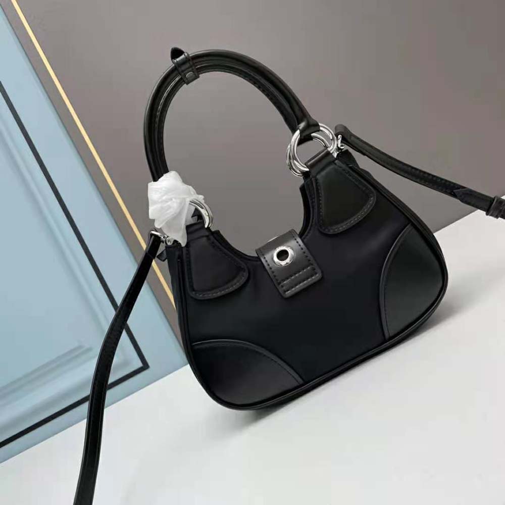 Side profile showing adjustable strap on Prada Women Moon Re-Nylon and Leather Bag-Black