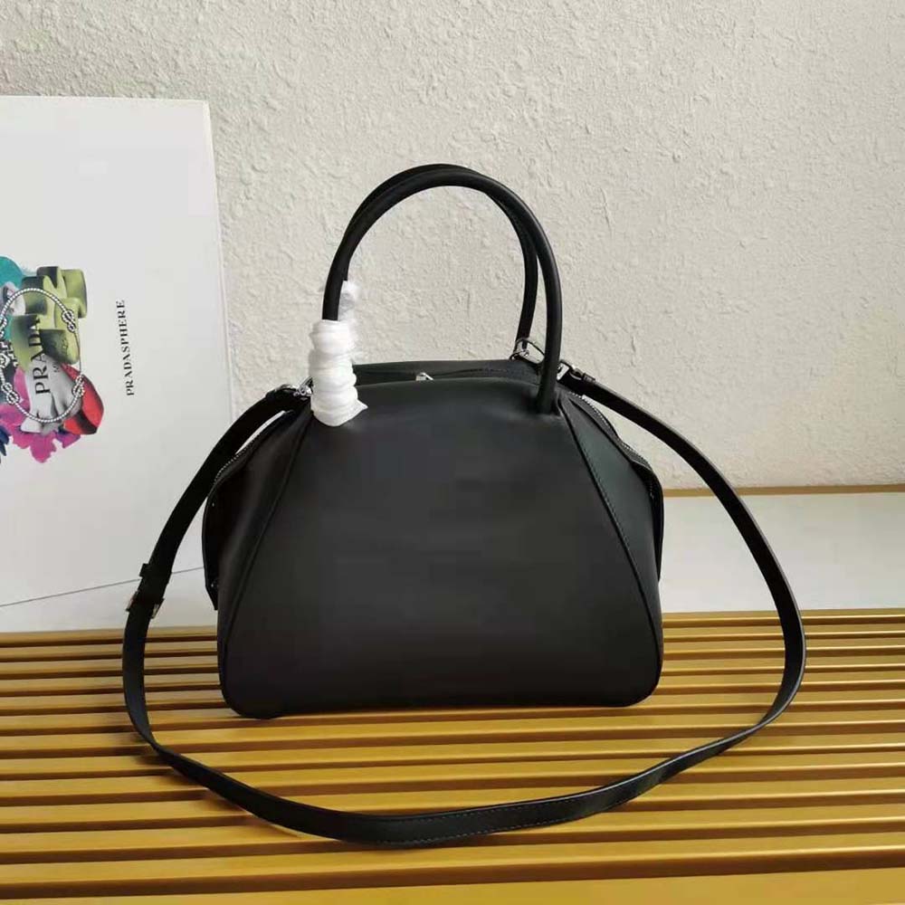 Side profile showing sleek silhouette of Prada Women Small Leather Prada Supernova Handbag