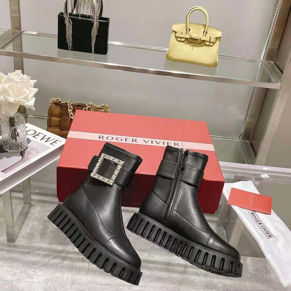Close-up on rhinestone buckle detail of Roger Vivier Women Viv’ Go-Thick Ankle Boots