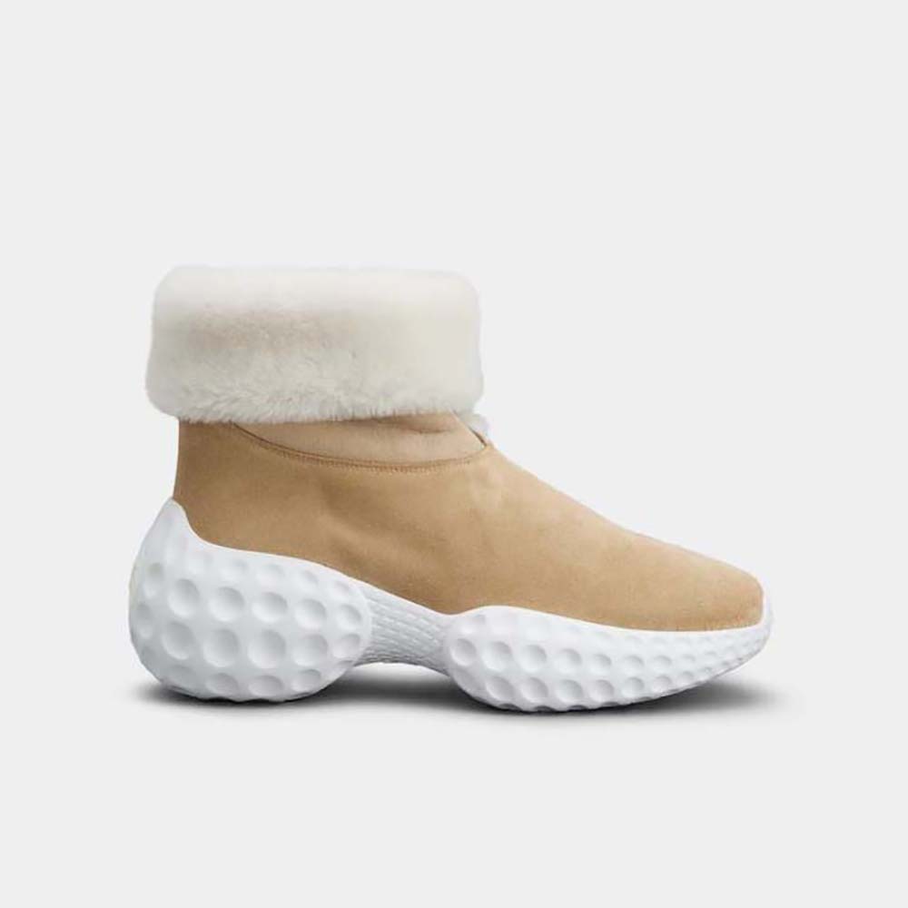 Side view of Roger Vivier Women Viv’ Run Light Fur Ankle Boots in Beige Suede