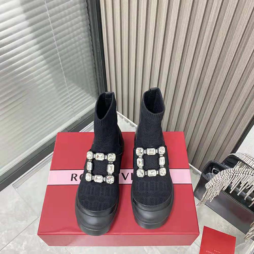 Close-up of sparkling rhinestone buckle on Roger Vivier Women Walky Viv’ Boots