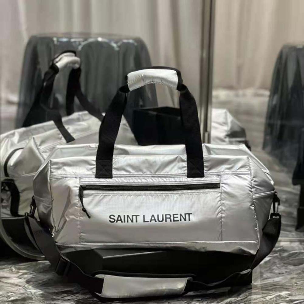 Close-up of silver YSL hardware on Men Nuxx Duffle bag