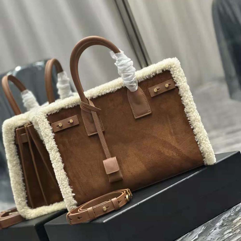 Side profile showing slim silhouette of Saint Laurent YSL Men Sac De Jour Thin Large