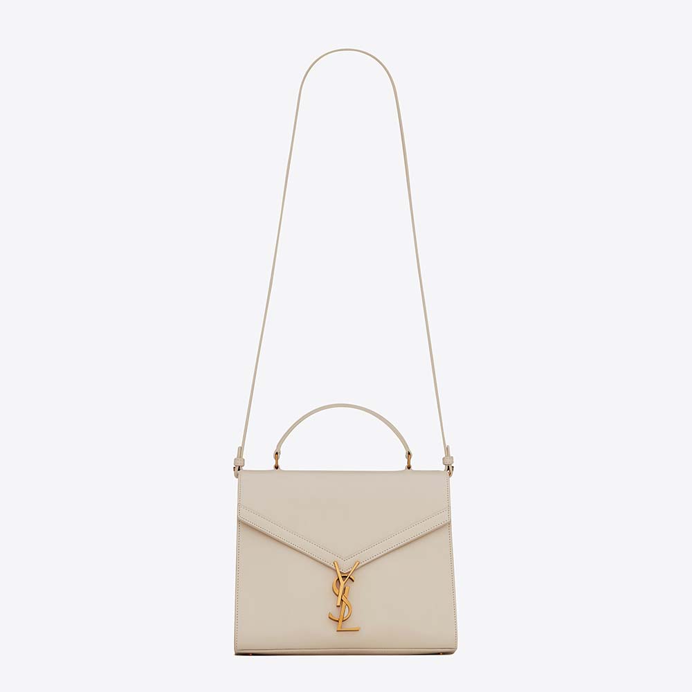 Front view of Saint Laurent YSL Women Cassandra Medium Top Handle Bag in white leather