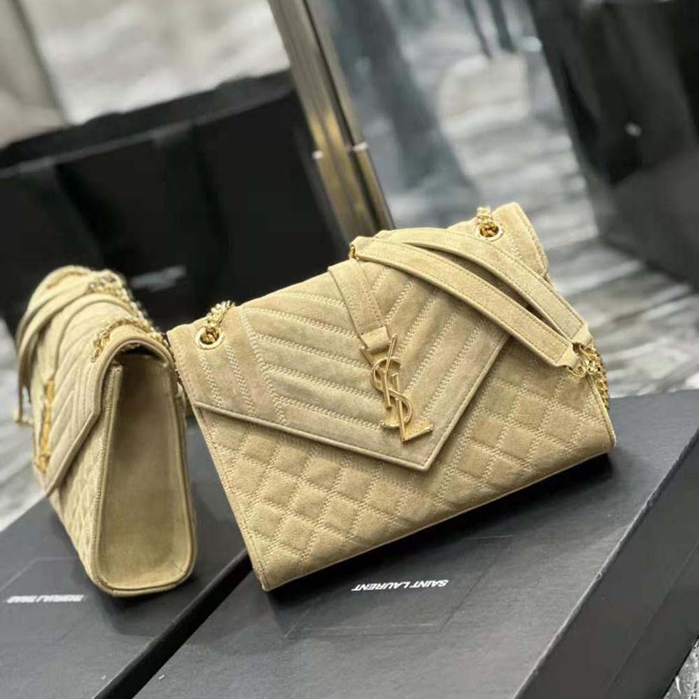 Side angle showing flap closure and texture of Saint Laurent corduroy bag